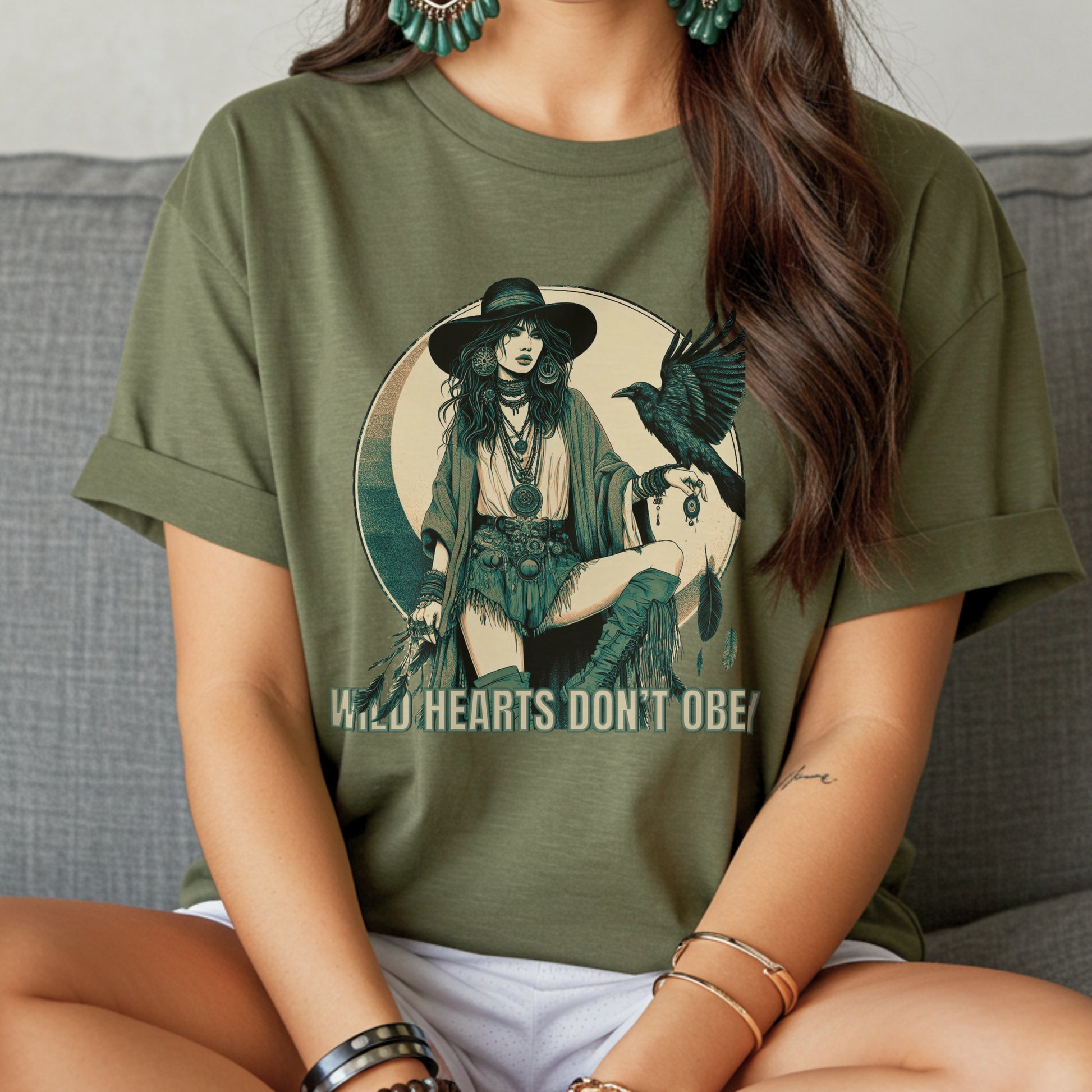 Woman wearing a green t-shirt with a graphic design and text