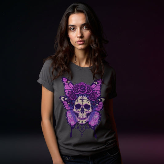 Woman wearing a dark t-shirt with a colorful skull and butterfly design on a dark background