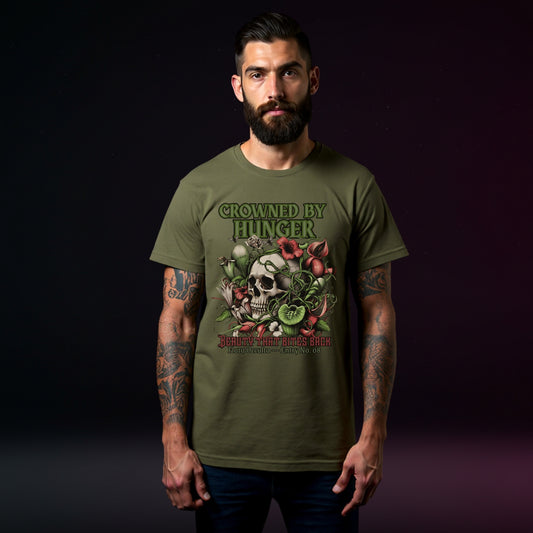 Man wearing a green t-shirt with a skull and floral design on a dark background