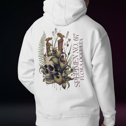 White hoodie with a skull and floral design on the back against a black background